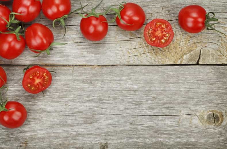 The fastest and easiest way to slice a bunch of cherry tomatoes
