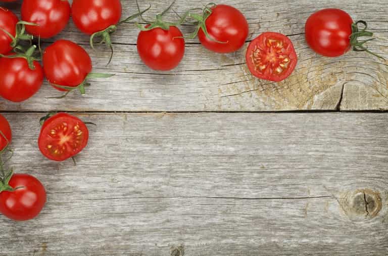 The fastest and easiest way to slice a bunch of cherry tomatoes