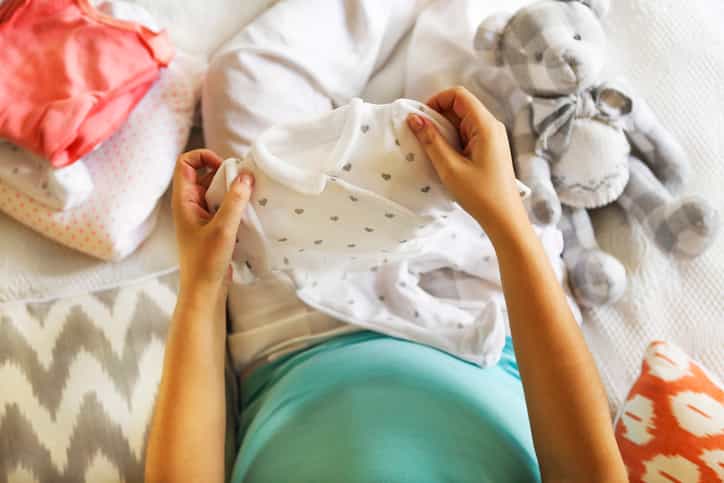 Expecting mum says she debating with husband about when to shop for their baby