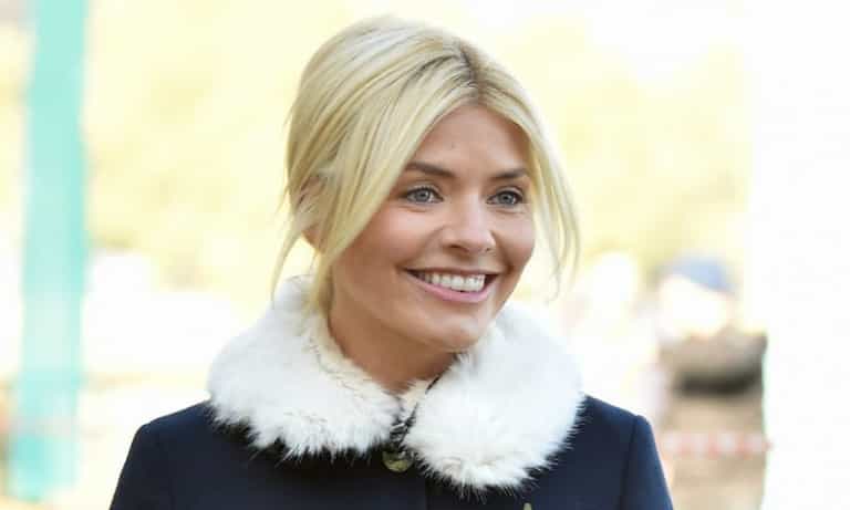 Holly Willoughby wore the most STUNNING €84 green sequin skirt from warehouse this morning