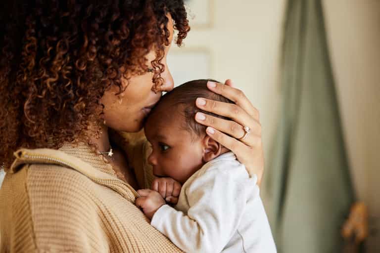 Stroking your baby’s head can make them feel physically better