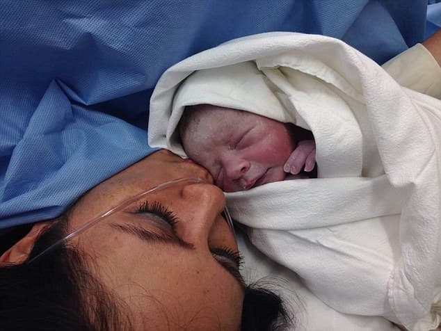 Update: Couple are reunited with their swapped newborn son